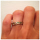 Jasmine ring in 14K yellow gold with multi colored stones on hand with other ring sold separately