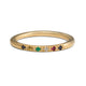 Our Jasmine ring in 14K yellow gold. This spin on a classic band features 6 beautiful stones that include a mix of diamond, sapphires, ruby and emerald for a rainbow of colors.