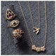 Our Laura necklace This beautiful flower pendant features 3 flowers together that each feature 6 brilliant diamonds in each flower and hangs from an 16" gold chain shown with other jewelry