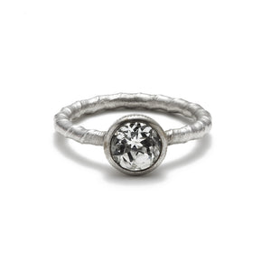 Our Lita ring in 14K white gold with 1ct round white diamond center stone