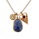 Tanzanite charm necklace with tanzanite charm, blossom flower charm with white diamond and heart pendant with rubies in 14K yellow gold
