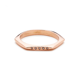 14K rose gold hexagon shaped band hand carved with 5 white diamonds in the front.