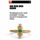 Olivia ring with green emerald center stone and white diamonds on side top and bottom on cover of magazine