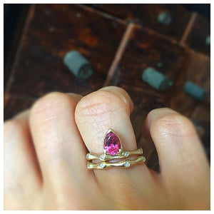  Seaweed Pear Center Tourmaline with diamonds seaweed diamonds both in 14K yellow gold on finger