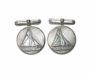 Lulu &amp; Shay Handmade Fine Jewelry Sailboat Cufflinks. These sailboat cufflinks are perfect for any occasion inspiring adventure.   They measure 3/4 of an inch in diameter.  Shown in Sterling Silver. 