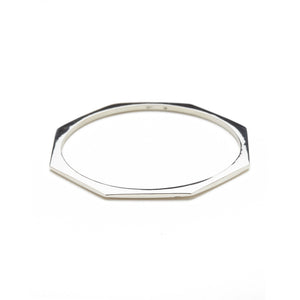 Handmade Fine Jewelry Sterling Silver Hexagon Bangle. These elegant Hexagon bracelets come in 2 sizes. The Thin Hexagon Bracelet measures approximately 2.75mm thick at its widest. The Wide Hexagon Bracelet measures approximately 4mm thick at its widest. Perfect on their own or stacked together.