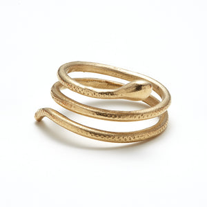 Handcarved snake ring shown in 14K yellow gold