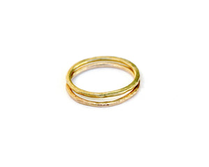 2 thin circle bands in 14K yellow and 14K rose gold with hammer texture all around