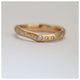 Wave diamond ring in 14K yellow gold with diamonds
